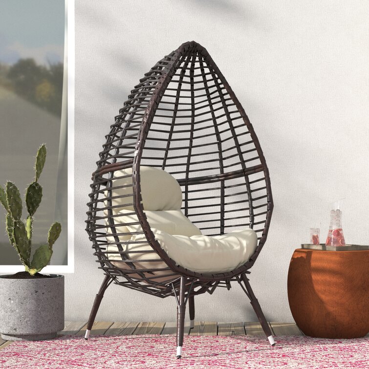 Wicker teardrop outlet chair with cushion